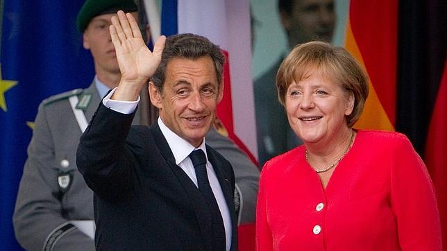 Alemania y Francia pactan que la banca participe en el segundo rescate griego de forma voluntaria