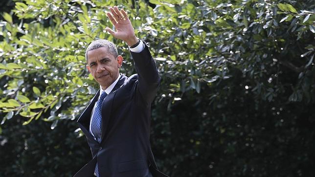 Obama apremia a Merkel y Sarkozy para avanzar en el segundo rescate griego Obama apremia a Merkel y Sarkozy para avanzar en el segundo rescate griego