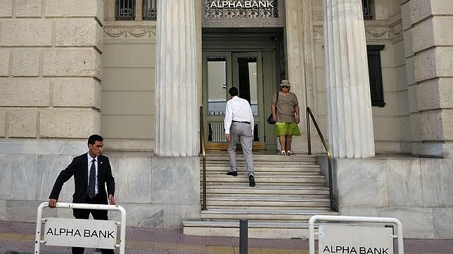 Los dos mayores bancos privados griegos se fusionan y disparan la Bolsa de Atenas