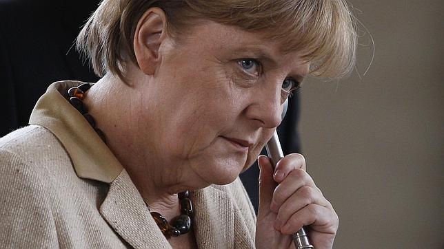 Merkel y Sarkozy se limitan a reiterar que el futuro de Grecia está en el euro Merkel y Sarkozy se limitan a reiterar que el futuro de Grecia está en el euro