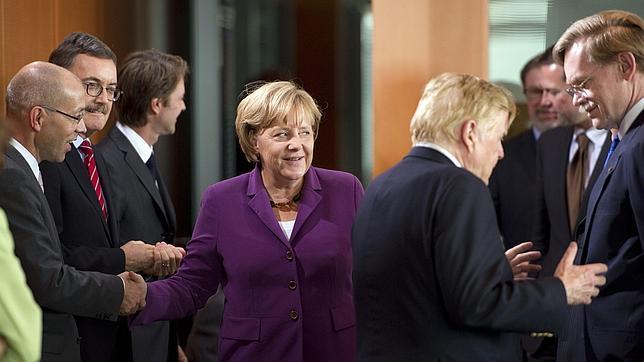 Merkel apoya la propuesta de Barroso de una tasa a las transacciones financieras Merkel apoya la propuesta de Barroso de una tasa a las transacciones financieras