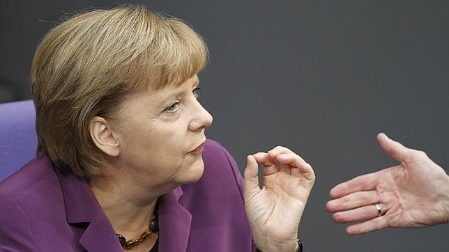 Merkel exige a los socios europeos que dejen de «vivir del crédito» Merkel exige a los socios europeos que dejen de «vivir del crédito»