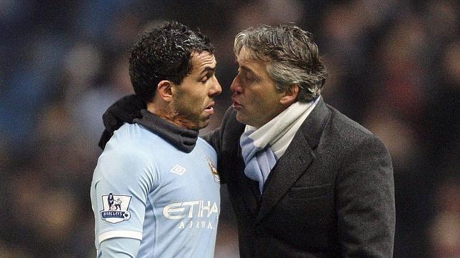 Tévez solo pagará la mitad de su multa Tévez solo pagará la mitad de su multa