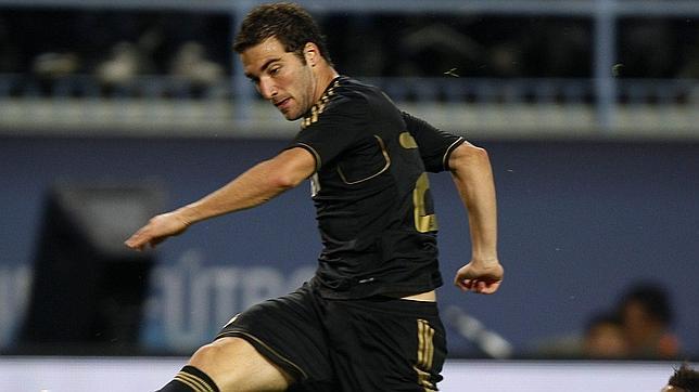 Un gol de Higua�n resuelve un partido gris