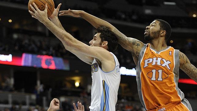 Rudy Fernández pierde toque en su debut con Denver Nuggets Rudy Fernández pierde toque en su debut con Denver Nuggets