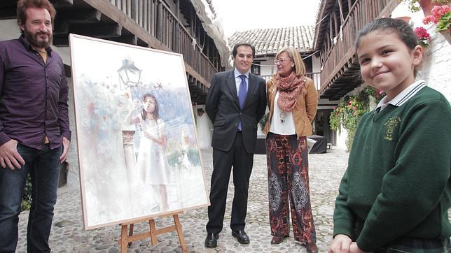 Camilo Hu�scar posa con su cartel, junto a Jos� Antonio Nieto, Amelia Caracuel y su modelo, Minerva