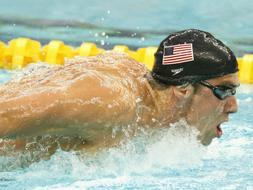 Michael Phelps da el primer paso hacia el reto de los ocho oros, imponiéndose en la final de los 400 estilos
