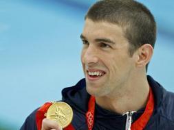 Phelps pasa a la historia al sumar su quinto oro en Pek�n