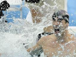 Michael Phelps iguala a Mark Spitz con su s�ptimo oro, esta vez en unos pol�micos 100 metros mariposa