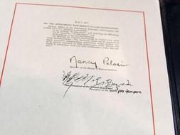 Obama promulga el plan de estímulo económico