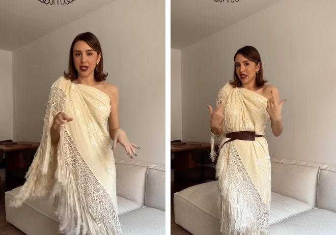 Marina García enseñándo a ponerse el mantón como vestido