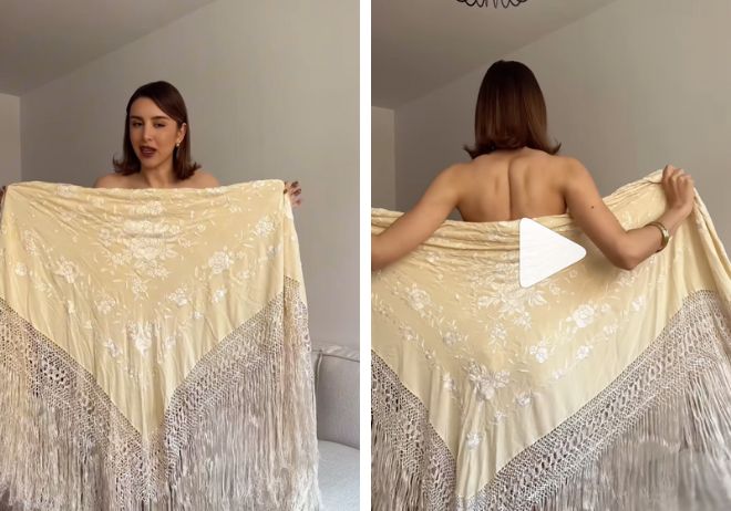 Marina García enseñándo a ponerse el mantón como vestido