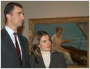 23/01/04.El Pr�ncipe de Asturias y su prometida, posan junto al cuadro "En la barca" durante la visita que realizaron en privado a la exposici�n de Edouard Manet, en el Museo del Prado.
