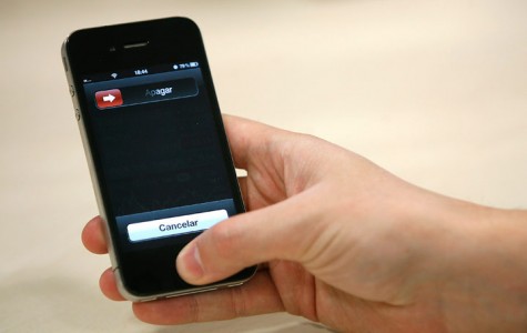 Pulsar sobre el botón de inicio del iPhone.